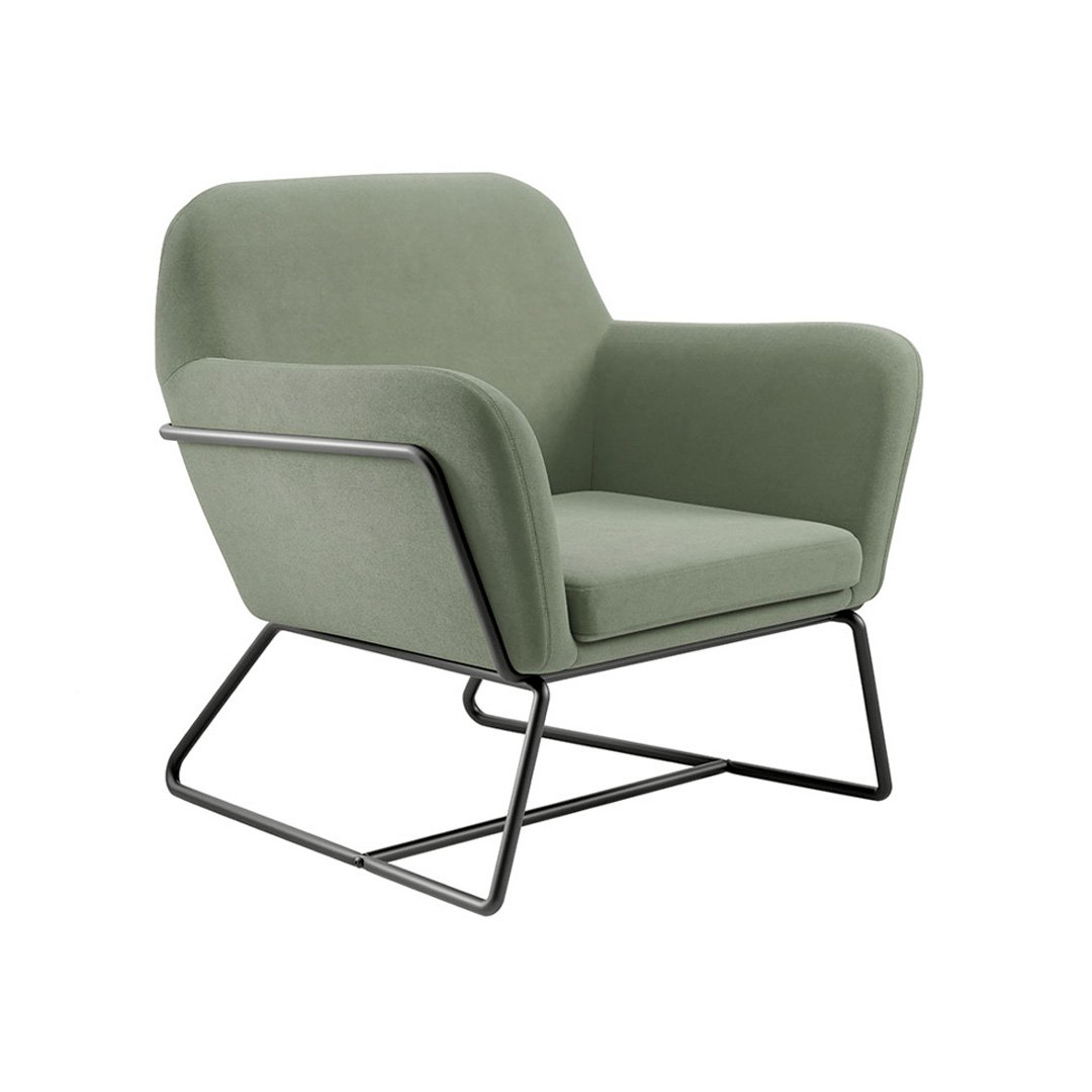 Angled view of the Charlie armchair with an emphasis of the round metal legs and frame