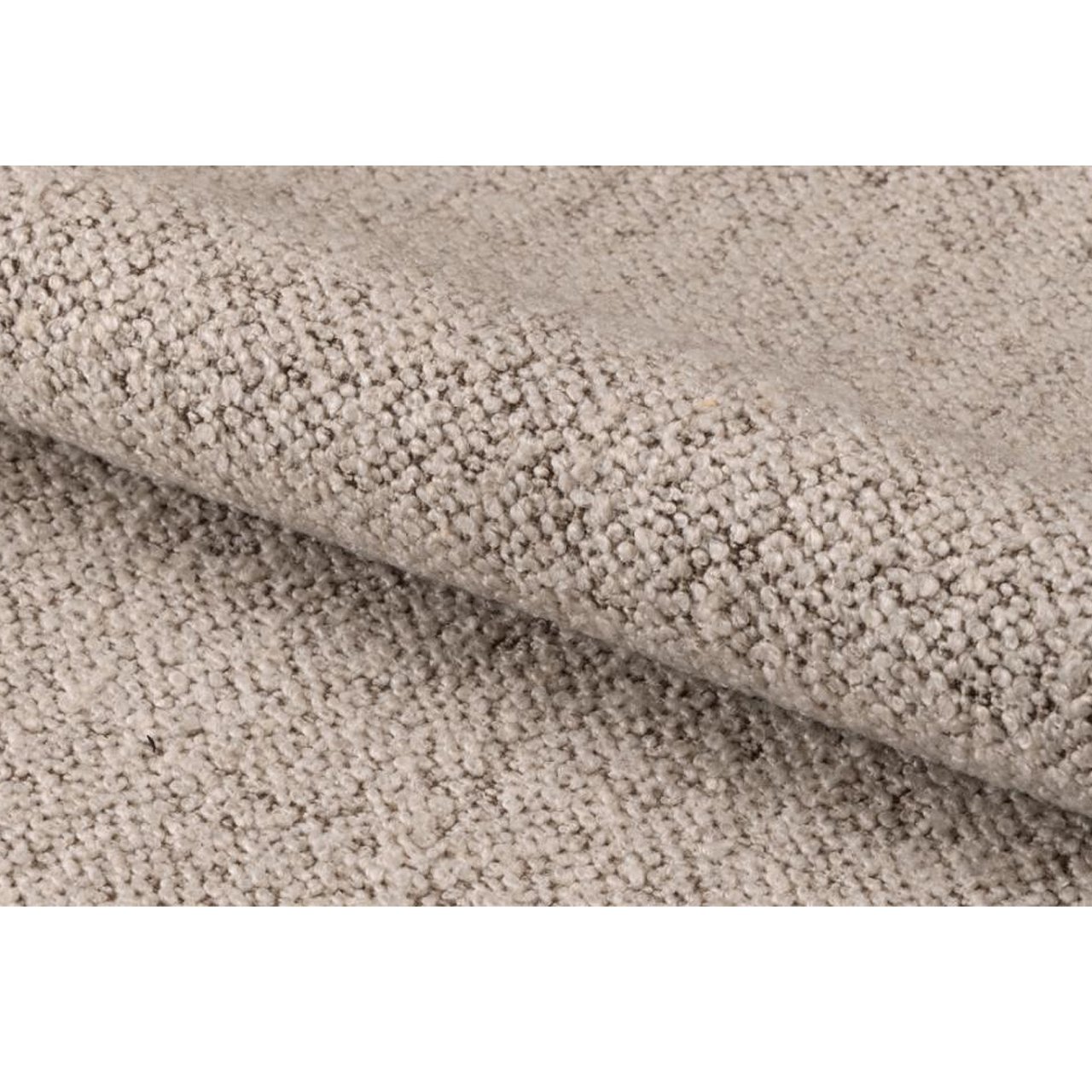 Zoom in on the fabric of the armchair and it's soft boucle finish.