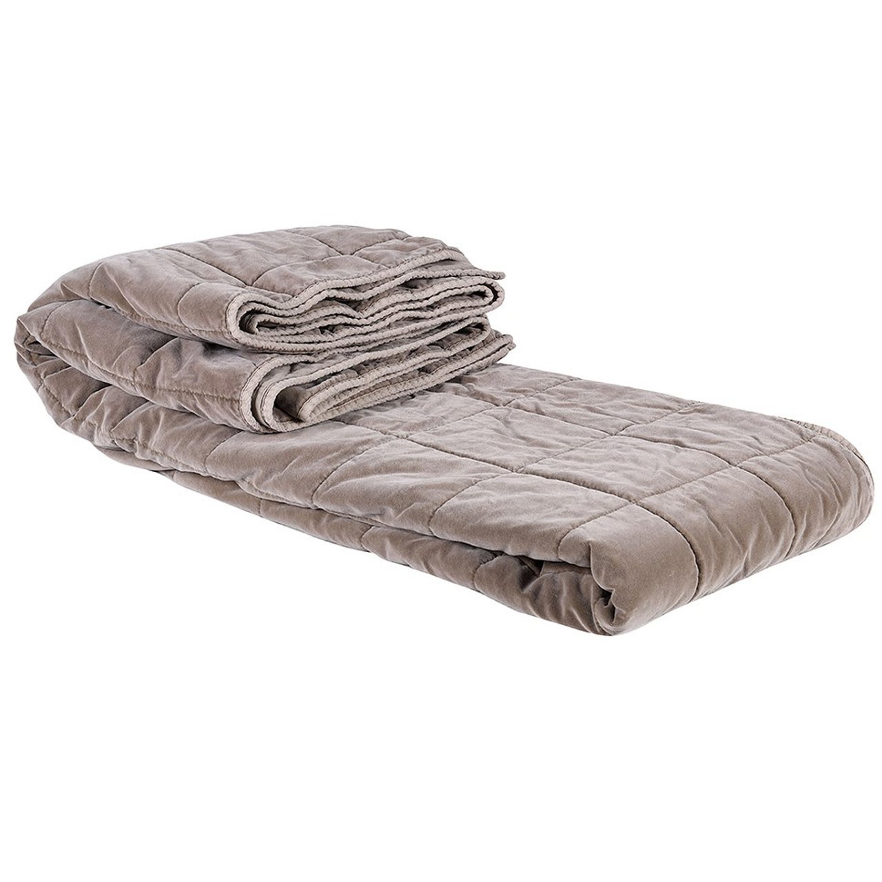 Folded up taupe quilt