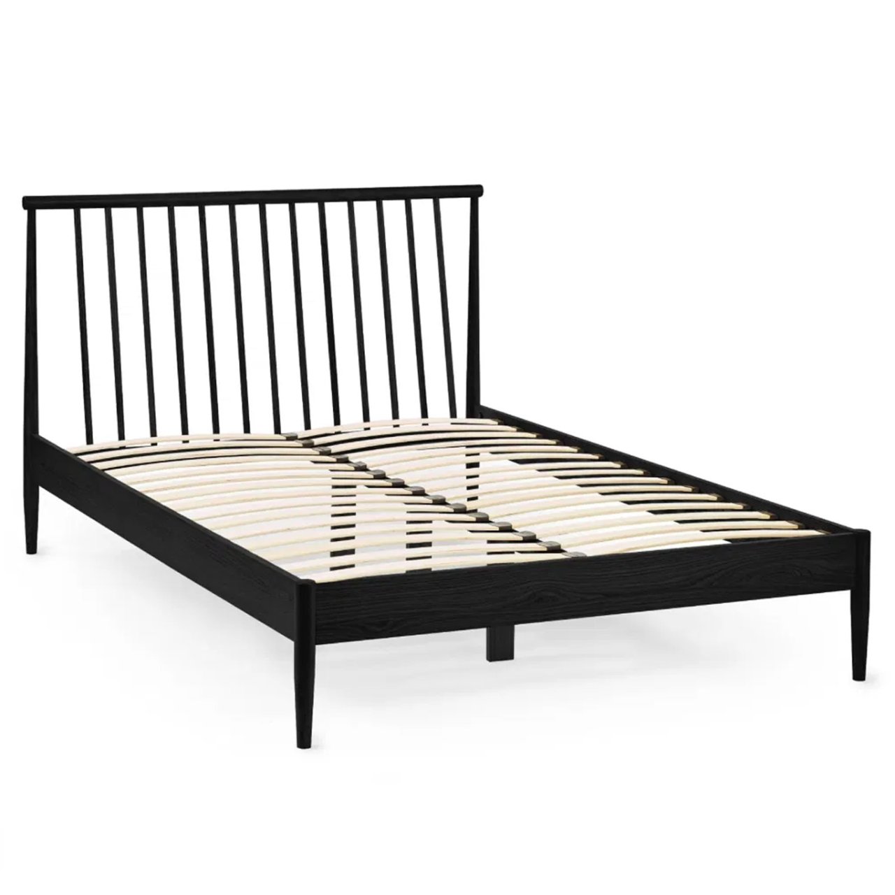 angled view of the spindle black bed with tapered feet