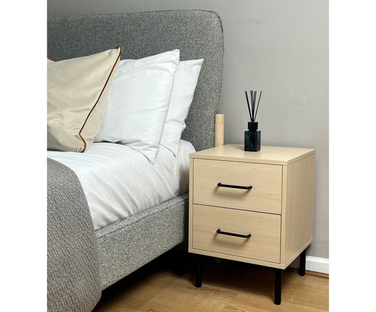 Zoomed in view of the william 2 drawer bedside alongside the modern Cove Bed