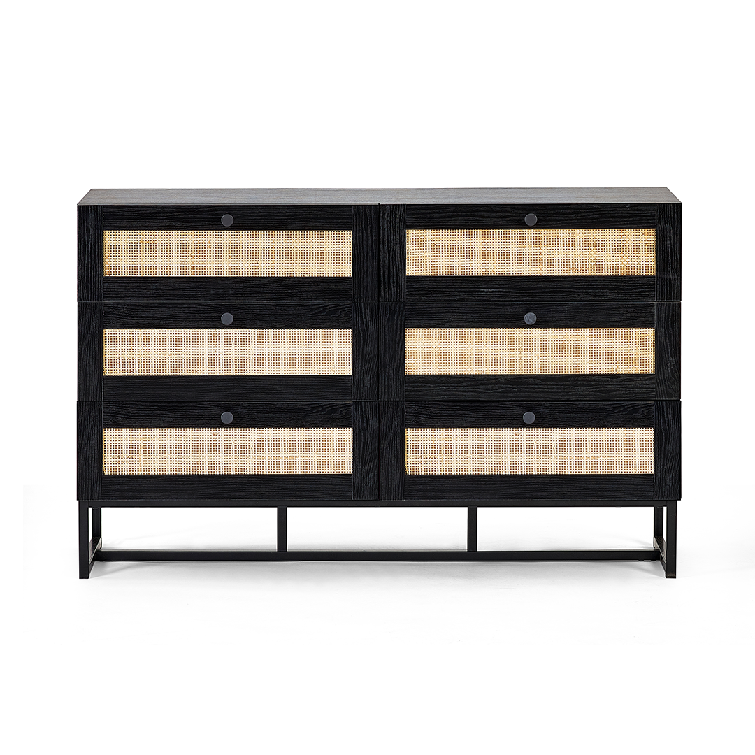 Front view of the black Padre 6 drawer chest highlighting the contrast between the black veneer and the rattan accents on the drawers