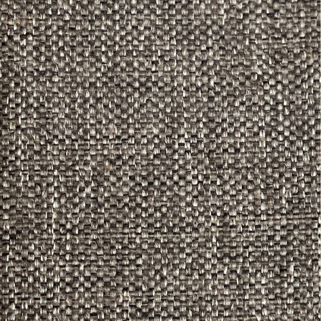 A swatch of the grey linen fabric that the headboard's upholstery is made of