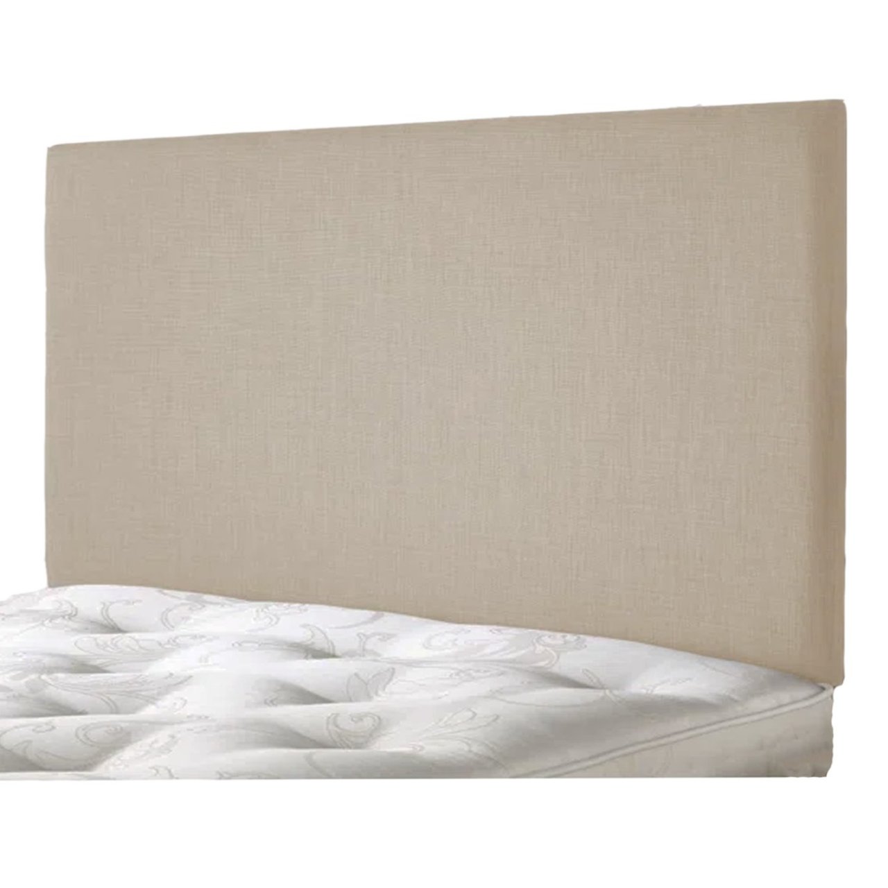 Angled view of the vanilla coloured headboard in rectangular shape attached to a bed