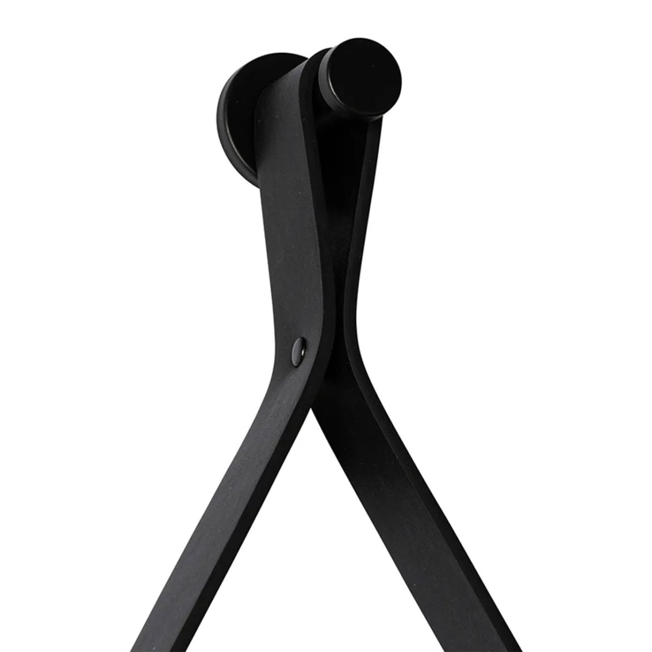 Zoom in on the black, mirror strap attached to a hanger