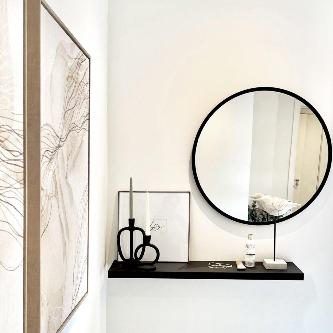 Lifestyle shot of the mirror in a show flat over