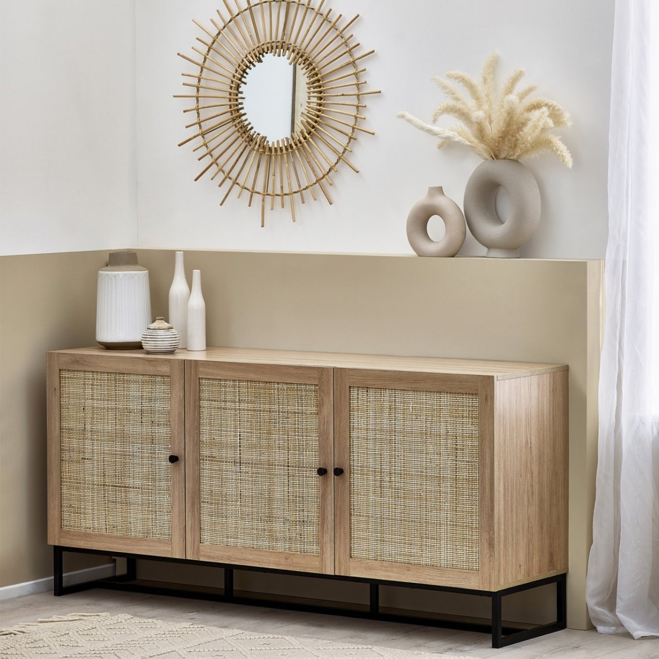 Lifestyle shot of the Padre Sideboard in a boho environment showcasing how well it fits in with similar furniture