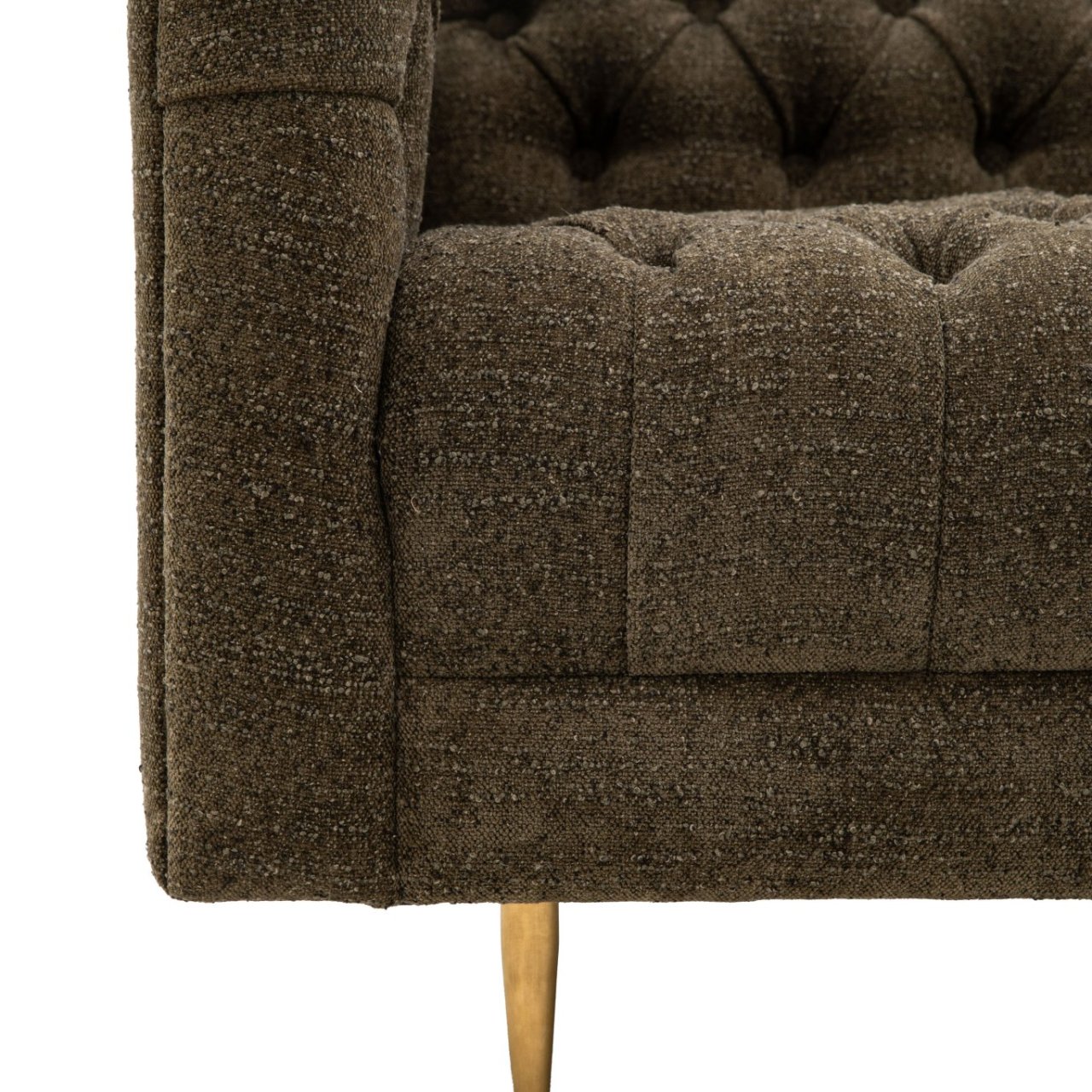 Zoom in on the front corner of the sofa showing the intricate stitching, soft chenille fabric and metal leg