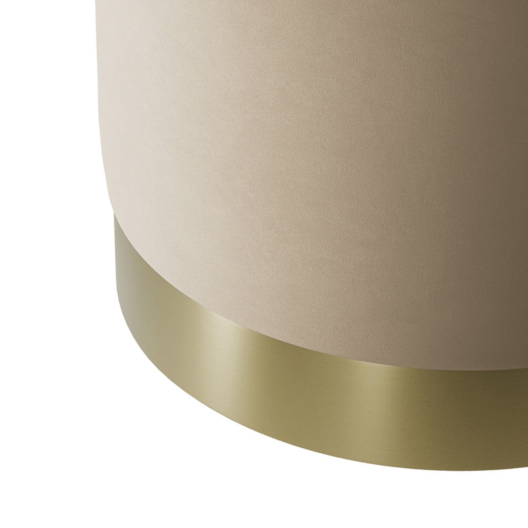 Close up of the bottom of the stool and the gold metal working in tandem with the rich mink velvet fabric