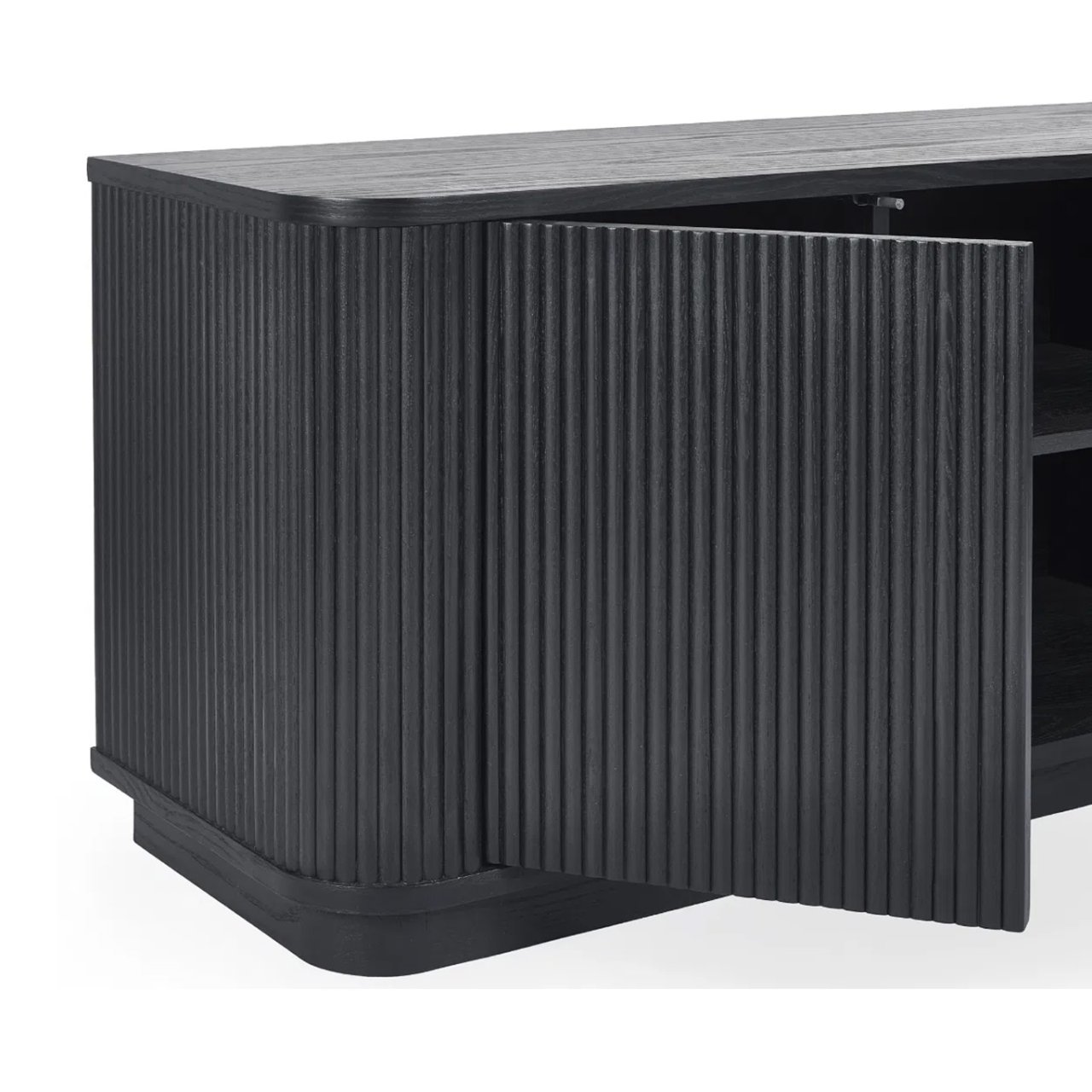 Zoom in on the fluted door of the TV Unit. it is open yet the detailing of its outside covers any joints