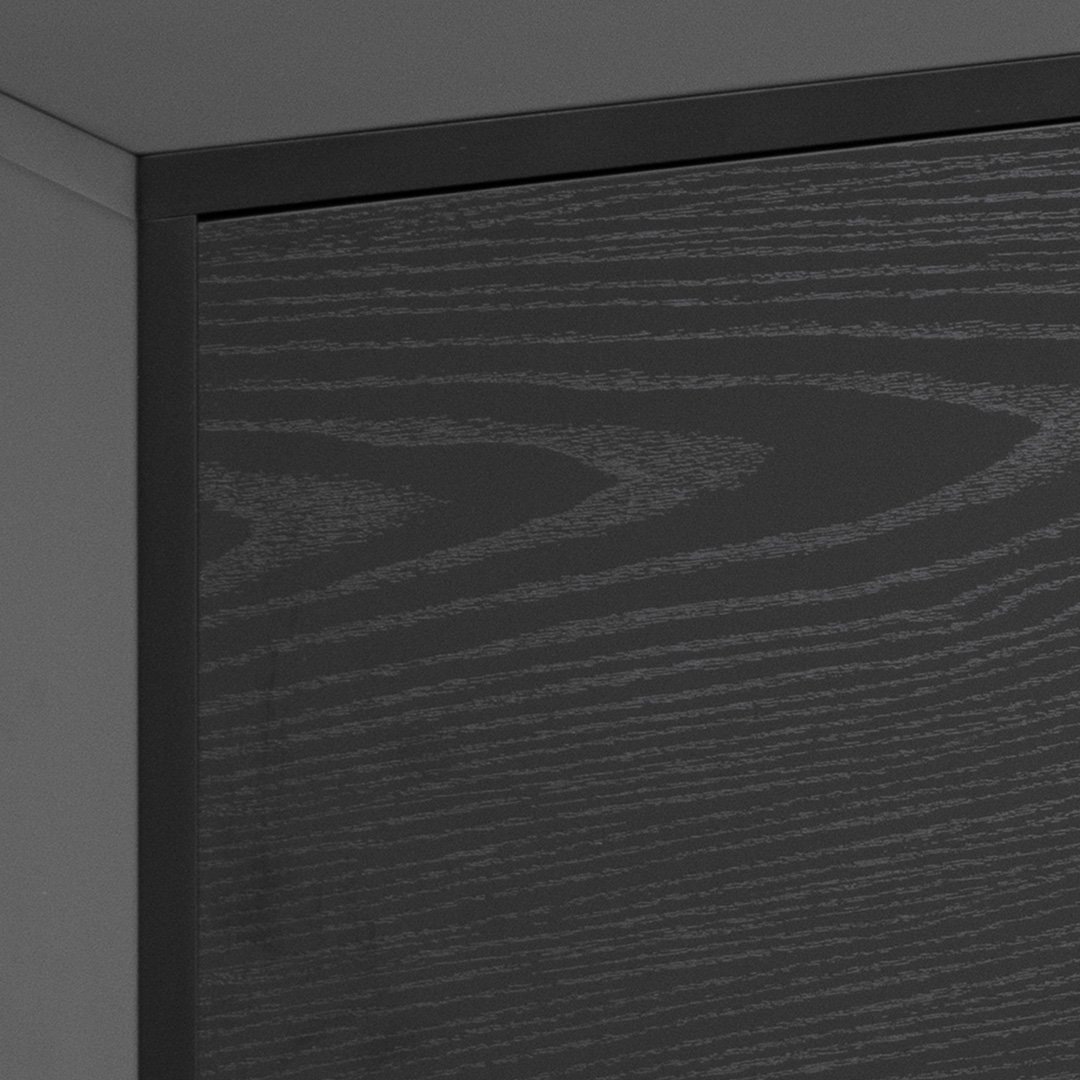 Close up of the edge of the See TV Unit with a highlight of the black veneer