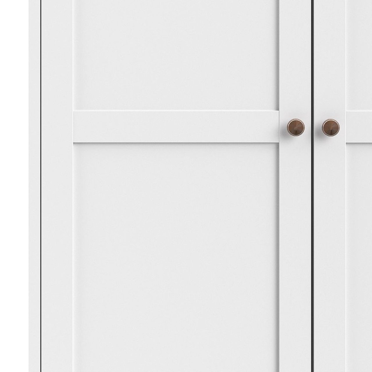 Partial view of the bottom left quarter of the wardrobe showing the two round handles and the square panels that adorn the doors of the wardrobe