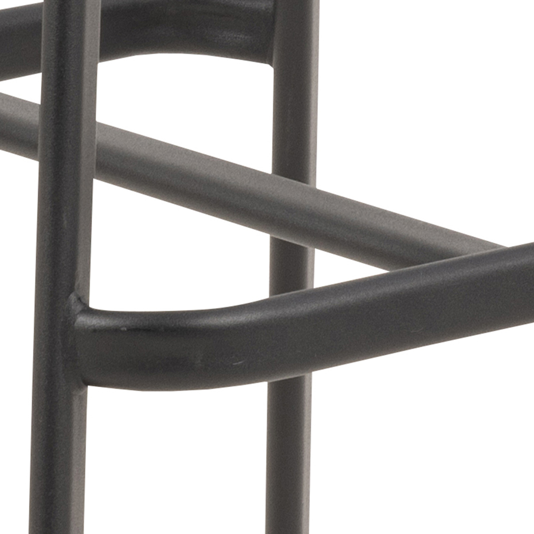 The durable metal frame and legs of the bar stool